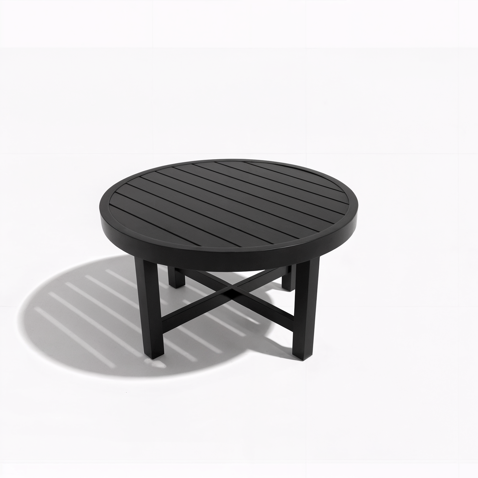 Callanna 5 Seater Curved Outdoor Lounge Set in Dark Grey with round coffee table featuring a slatted top, four legs with cross-bracing, displayed on a plain white background casting a soft shadow.
