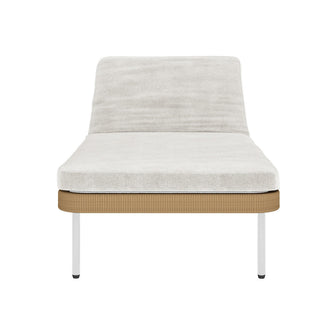 Culion Wicker & Aluminium Outdoor Sun Lounger in Light Beige, featuring a cushioned platform with an inclined backrest, woven-style skirt, and slim metal legs, exemplifies modern outdoor luxury.