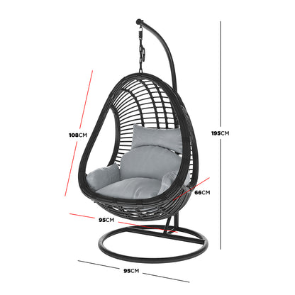 Deanna Curved Rattan Hanging Outdoor Egg Chair in Black, featuring a dark woven shell on a curved stand, light gray cushions, and key dimensions highlighted in red and black lines for reference.