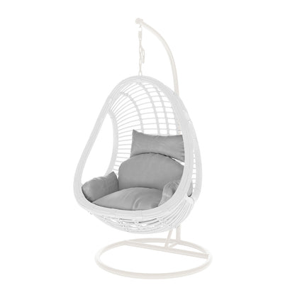 Deanna Curved Rattan Hanging Outdoor Egg Chair in White, featuring a woven cocoon-shaped seat with plush cushioned pads, suspended from a curved metal stand, ideal for indoor or patio lounging.