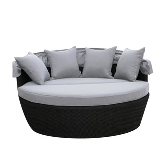 Close-up of Erith Wicker Outdoor Furniture Day Bed w/ Canopy, showcasing its plush cushions and sturdy wicker construction, ideal for outdoor relaxation and comfort.