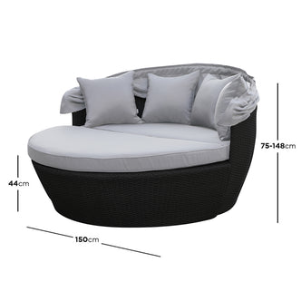 Erith Wicker Outdoor Furniture Day Bed w/ Canopy features a luxurious wicker design, padded cushions, and a protective canopy, ideal for outdoor relaxation, complete with an accompanying coffee table.