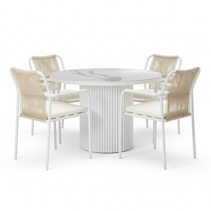 Evone 4 Seater Stone Outdoor Dining Table Set in Natural features a round, marble-look tabletop and four chairs with tan-rope backrests and light cushions, perfect for a modern patio.
