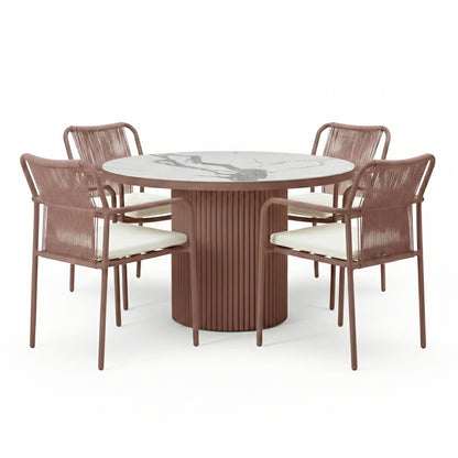 Evone 4 Seater Stone Outdoor Dining Table Set in Terracotta features a round marble-look tabletop and four armchairs with woven backrests and light cushions, perfect for stylish alfresco dining.