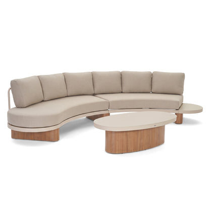 Modern curved sectional sofa with matching coffee table on a white background