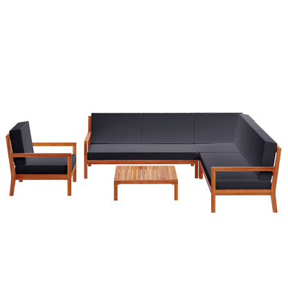 Haiti 7 Seater Outdoor Timber Corner Sofa Set Black, featuring sleek design, robust construction with wooden armrests, and a black cushioned seating, set against a wooden chair and table backdrop.