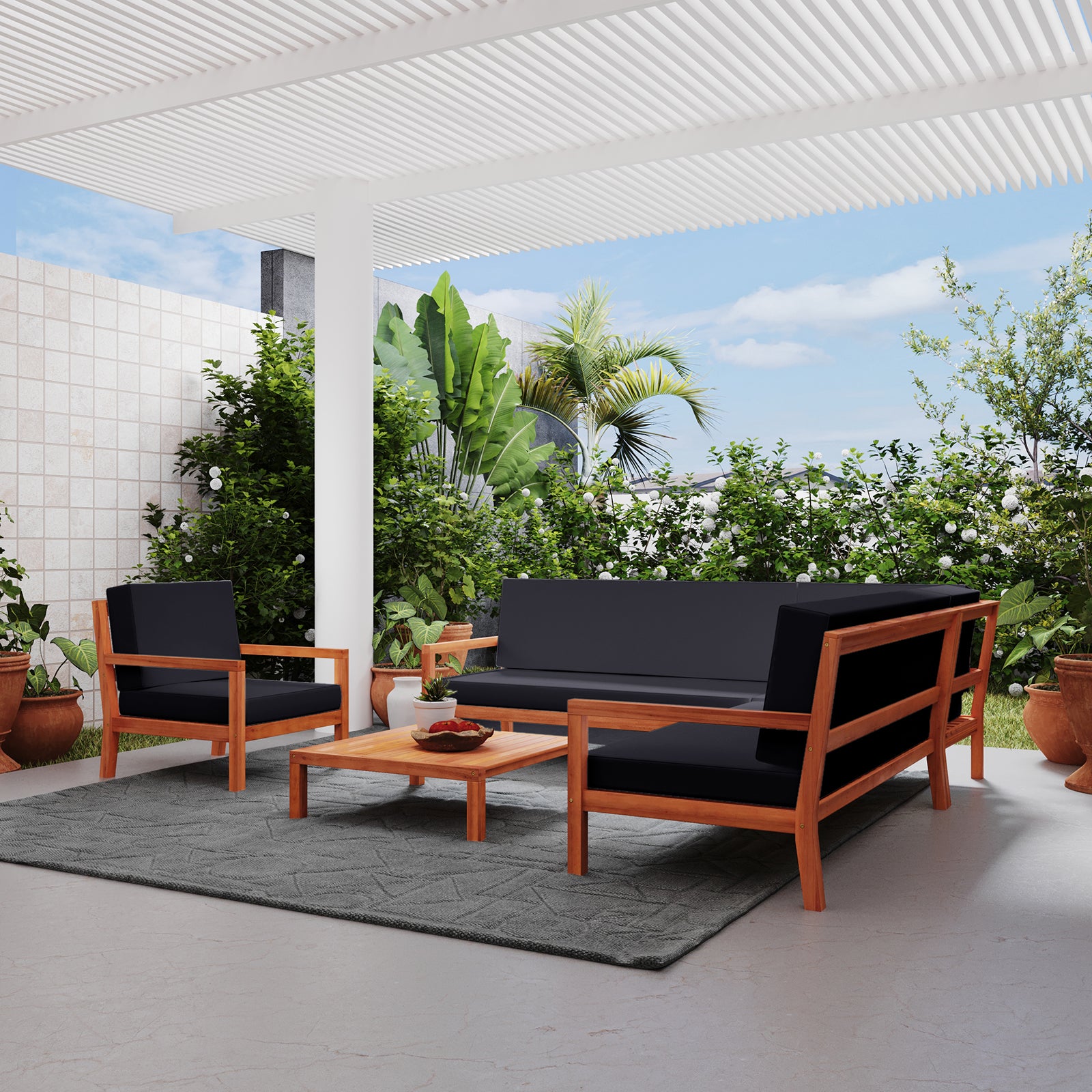 Haiti 7 Seater Outdoor Timber Corner Sofa Set Black, featuring robust eucalyptus timber frame, plush cushions, and spacious seating, is elegantly arranged on a patio, showcasing its stylish design and outdoor suitability.