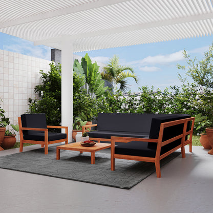 Haiti 7 Seater Outdoor Timber Corner Sofa Set Black, featuring robust eucalyptus timber frame, plush cushions, and spacious seating, is elegantly arranged on a patio, showcasing its stylish design and outdoor suitability.
