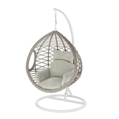 Hilda Large Outdoor Hanging Egg Chair features a teardrop-shaped woven rattan seat with cushioned padding, suspended from a curved white metal stand, offering stylish comfort and versatility for indoor or outdoor use.