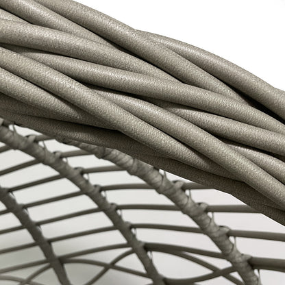 Hilda Large Outdoor Hanging Egg Chair in Sage, showcasing synthetic wicker strands woven around a sturdy metal frame, highlighting its robust construction typical of hanging egg-style seating furniture.