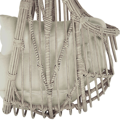 Close-up of the Hookipa Outdoor Rattan Egg Chair with Cushion in Sage, showcasing the intricate woven rattan frame and plush cushion, emphasizing its inviting design and craftsmanship.