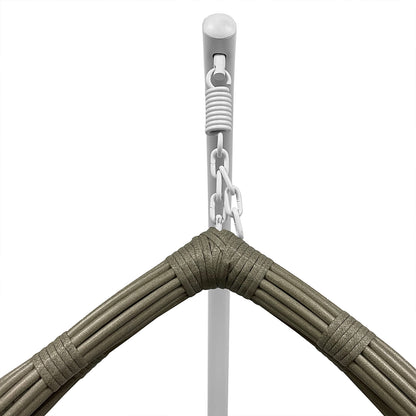 Close-up of Hookipa Outdoor Rattan Egg Chair with Cushion in Sage, showcasing its durable white metal suspension hardware, coil spring, and woven-rattan connection, highlighting the chair's robust design and craftsmanship.