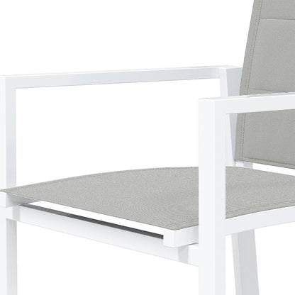 Close-up of the Jensen 6 Seater Aluminium Outdoor Dining Set showing a modern chair with a white metal frame and grey fabric seat, highlighting its contemporary minimalist design for versatile indoor-or-outdoor use.