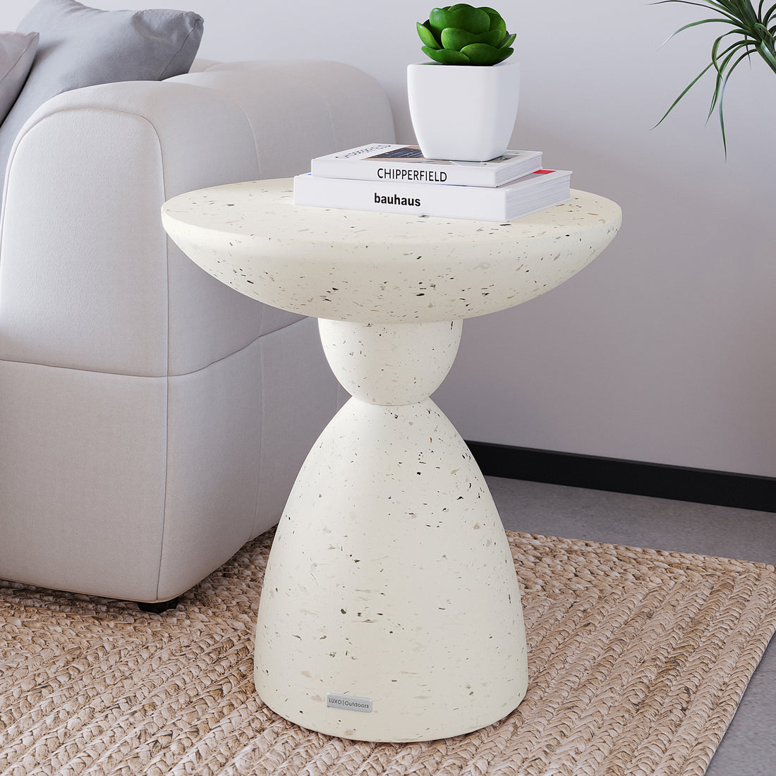 Junia Terrazzo Concrete Pedestal Side Table styled in a contemporary living room, perfect for indoor outdoor use - Lifestyle