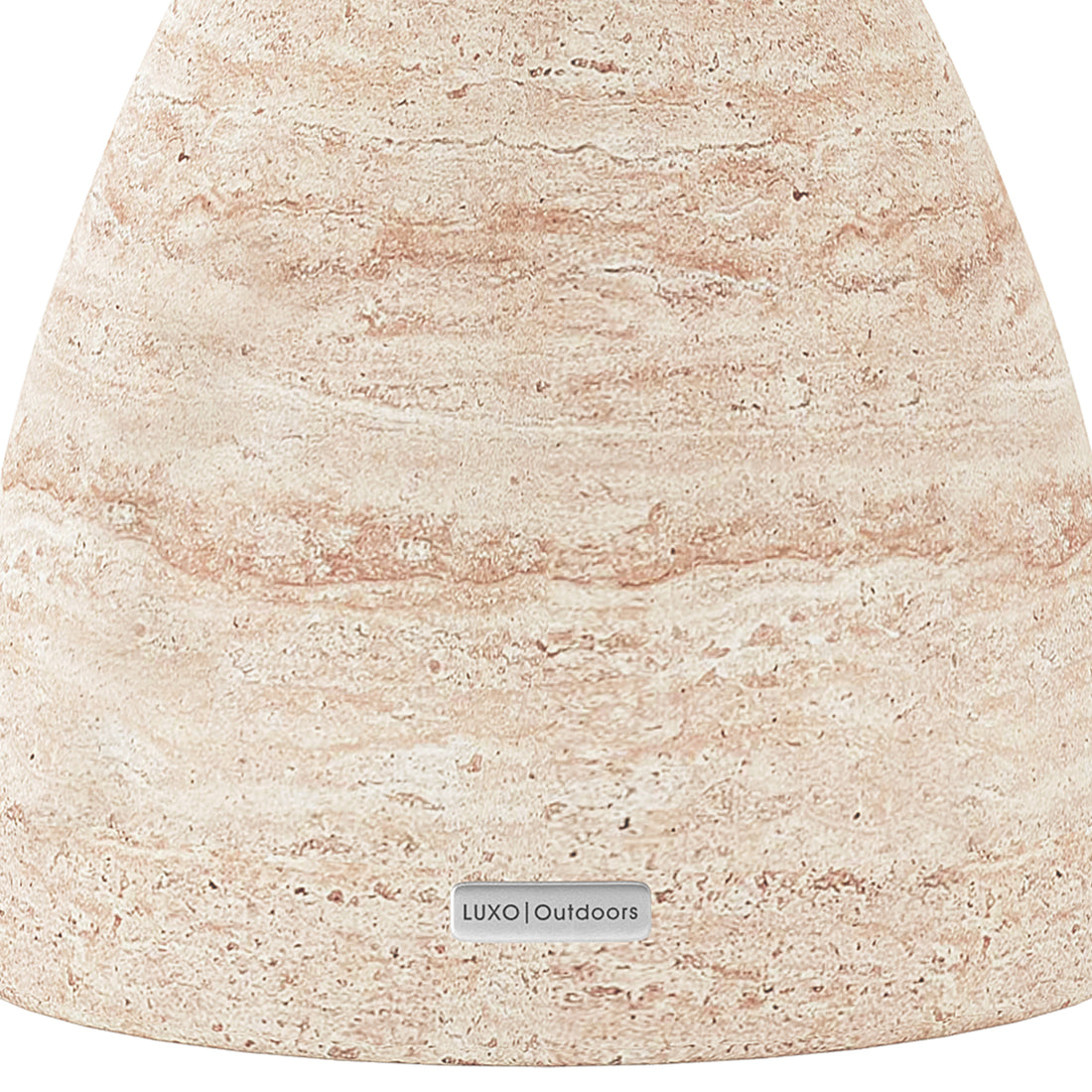 Detail shot of the Junia Travertine concrete side table's speckled surface and base, featuring the Luxo Outdoors tag