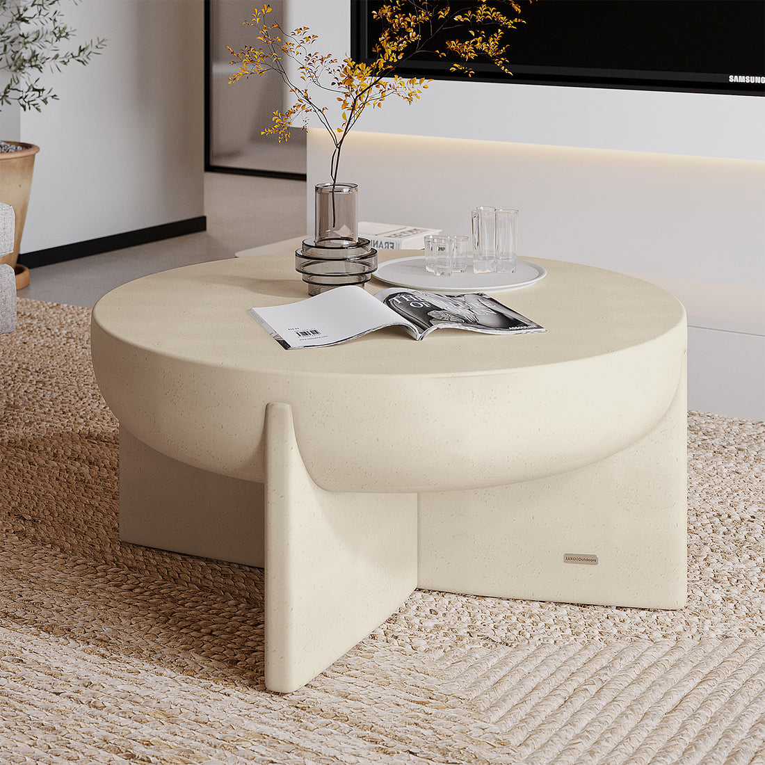 Kora Antique White Concrete Pedestal Coffee Table styled in a modern living room with decor, perfect for indoor outdoor use - Lifestyle