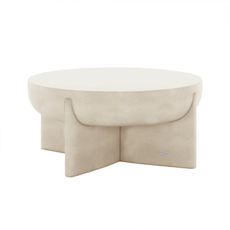 Angled view of Kora Antique White Indoor Outdoor Concrete Pedestal Coffee Table, showcasing its round top and unique base