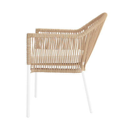 Side view of Krates & Mindanao 5pc Outdoor Concrete Dining Set w/ Wicker Chairs Beige, showcasing wicker chair's intricate rattan weave and sturdy armrest, emphasizing its outdoor-ready design and elegant craftsmanship.