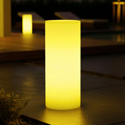 16 Colour Outdoor LED Bollard Light in Multicolour, glowing warmly on a patio deck at night, showcases its sleek, cylindrical frosted design, enhancing outdoor spaces with versatile, mood-setting illumination.