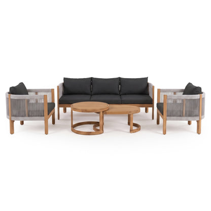 Modern outdoor furniture set on a white background with sofa, chairs, and coffee tables