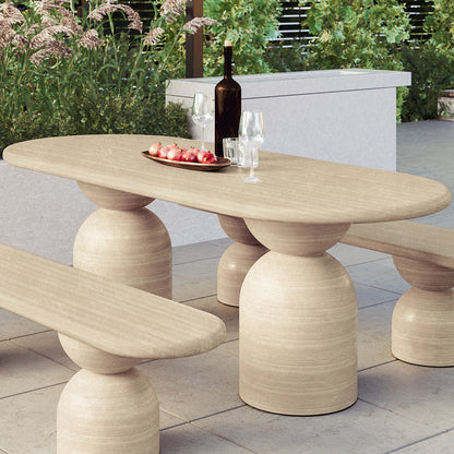 Lumen 220cm Oval Indoor/Outdoor Concrete Dining Table with elegant oval top and unique cone base, placed on an outdoor setting, showcasing its modern design and robust construction.