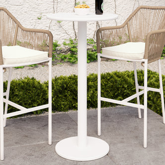 Luzon Aluminium Indoor & Outdoor Bar Table showcased on a patio, highlighting its sleek, modern design with a sturdy aluminium frame, suitable for versatile indoor or outdoor use.