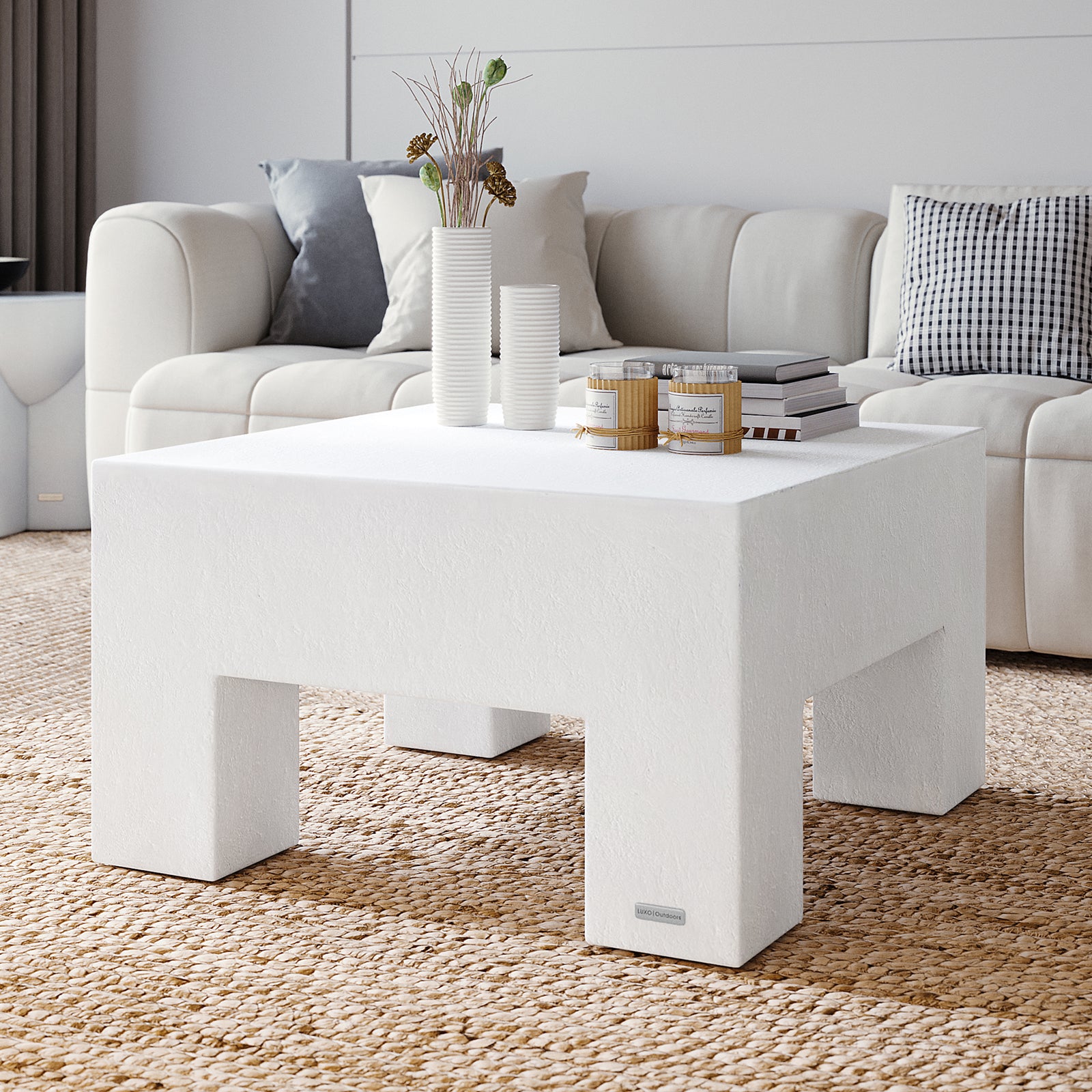 Maxon White Concrete Coffee Table styled in a contemporary living room with decor, perfect for indoor outdoor entertaining - Lifestyle
