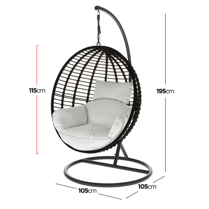Napili Outdoor Rattan Egg Chair with Cushion in Light Grey, featuring a woven egg-shaped seat, black metal stand, light-colored cushion, and back pillow, hanging from a curved metal frame.