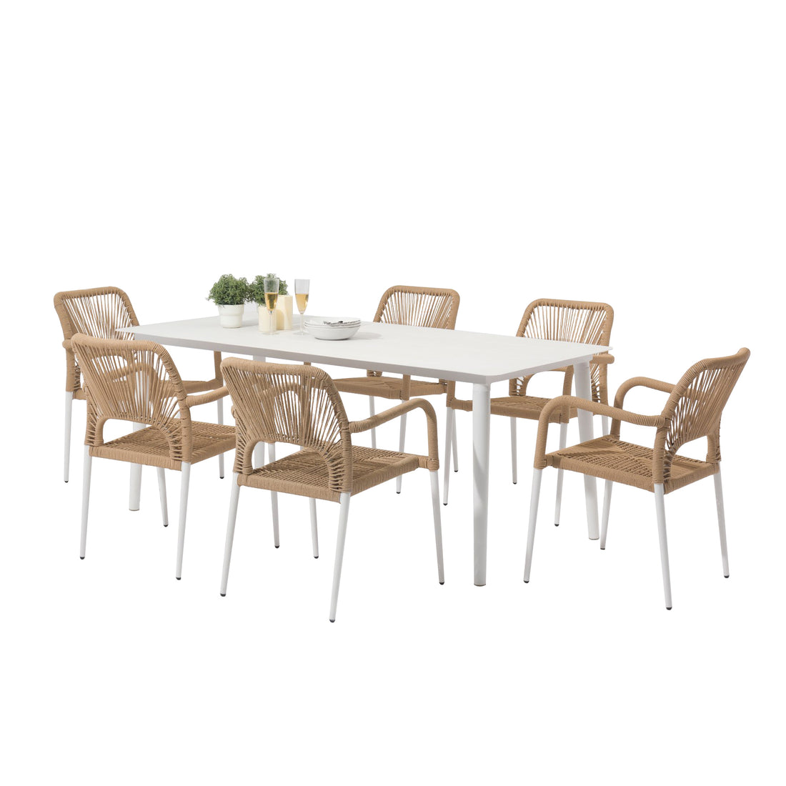 Navarre 6 Seater Aluminium Outdoor Dining Set in Natural features a white table with six tan wicker chairs, topped with a potted plant, bowl, candles, and champagne glasses, highlighting a relaxed outdoor setting.