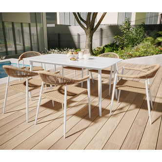 Nemma 6-Seater Aluminium Outdoor Dining Set Natural on a deck, featuring a sleek table and six chairs, ideal for outdoor gatherings, enhancing patio aesthetics with its contemporary design.