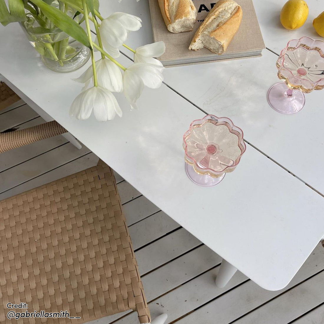 Close-up of the Nemma 6-Seater Aluminium Outdoor Dining Set showcasing a sleek table surrounded by six chairs, highlighting its contemporary design suitable for outdoor spaces like patios or gardens.