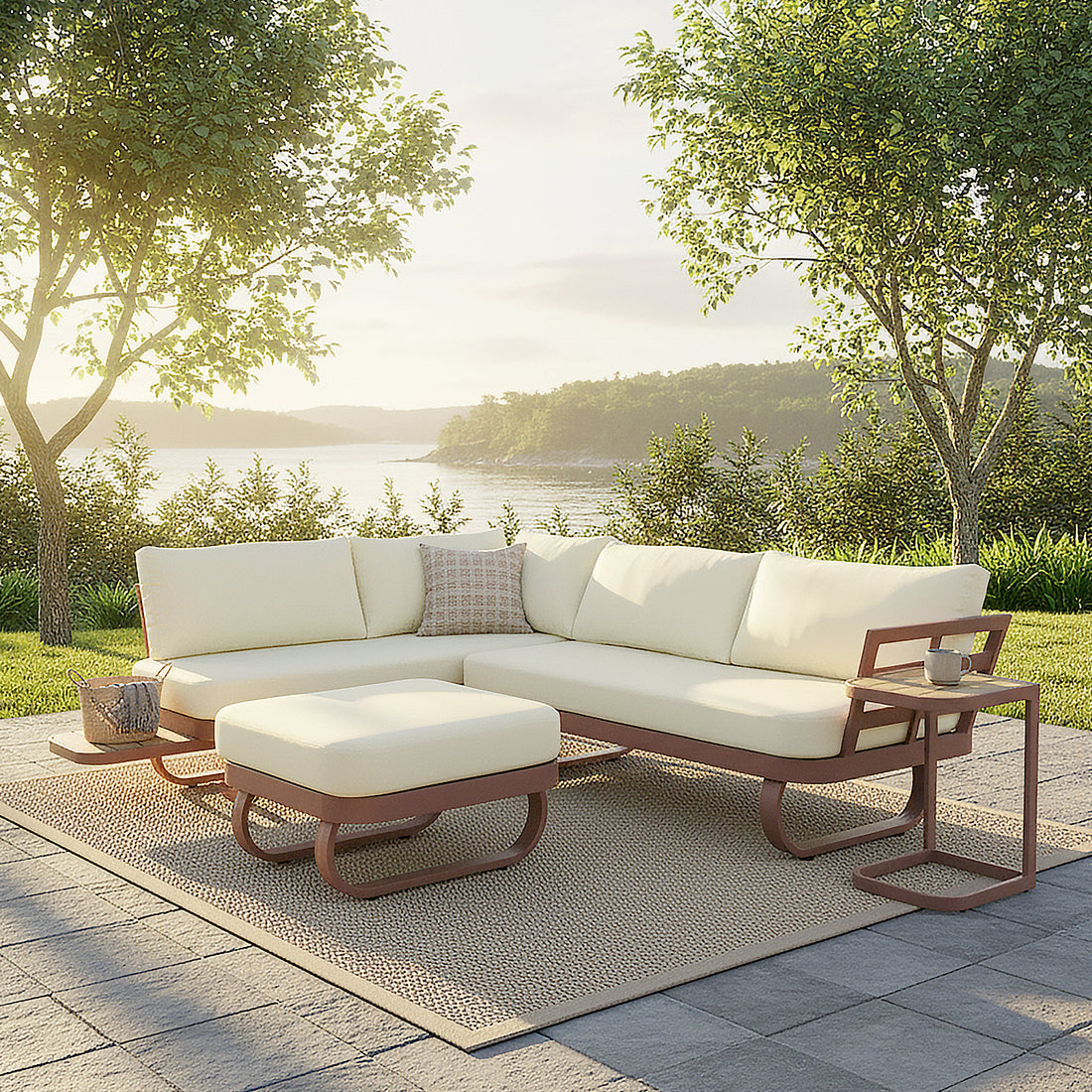 Paloma Modular Outdoor Lounge Set in Terracotta, featuring an L-shaped sectional with off-white cushions and a matching ottoman, set on a natural-fiber rug beside a serene lakeside view.