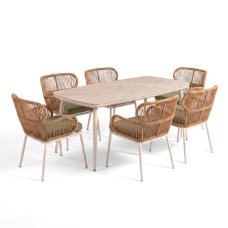 Dining table set with six chairs and green cushions on a white background