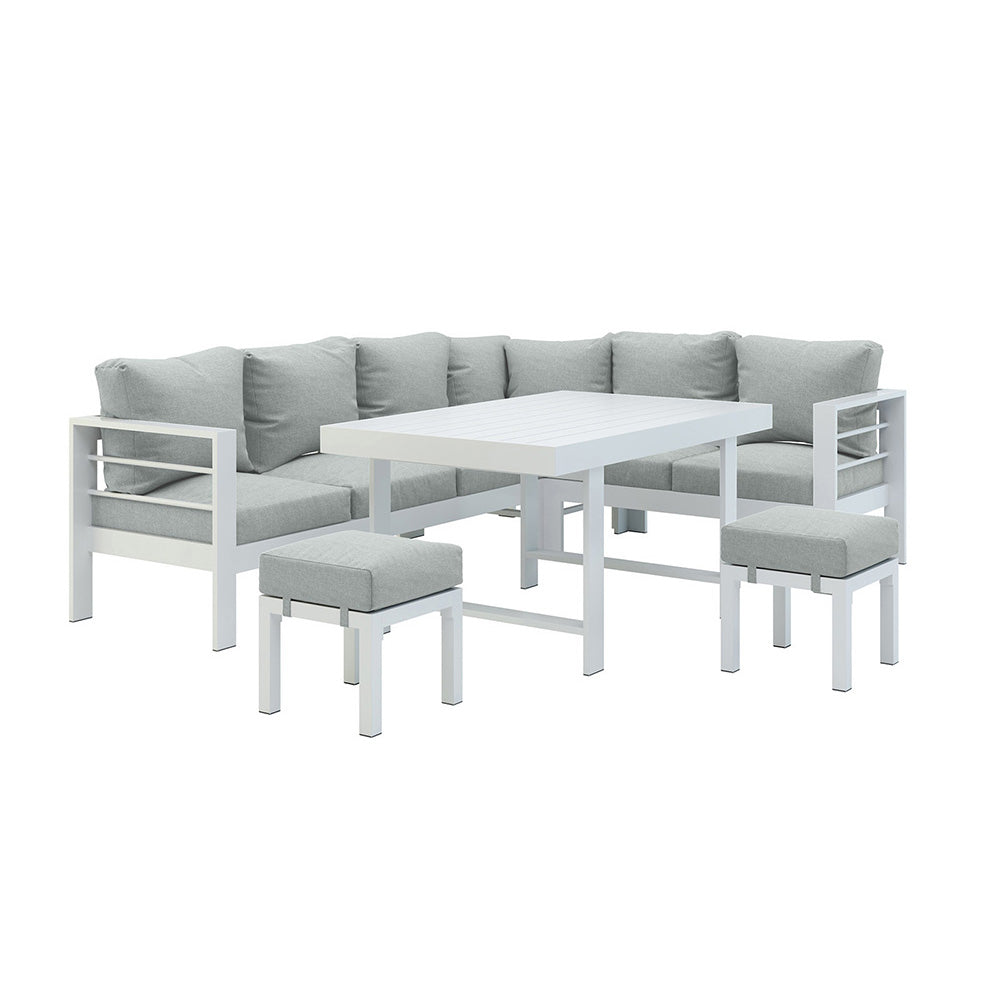 Portland Outdoor Corner Sofa Lounge with Footstools, showcasing plush cushions on a sturdy frame. A glimpse of the matching coffee table emphasizes its cohesive design, perfect for stylish outdoor relaxation.