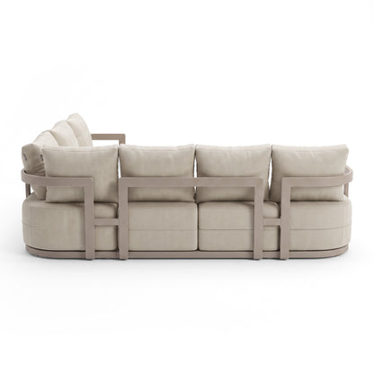 Back view of a beige sofa with wooden frame on a white background