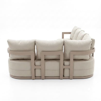 Full back view of a contemporary beige sofa on a white background
