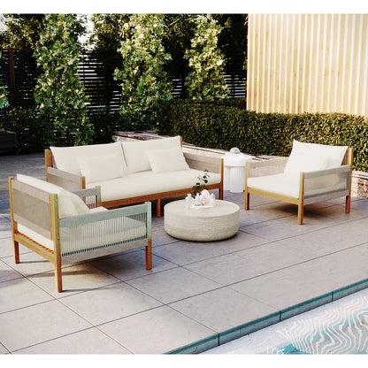 Savin & Myrtle Outdoor Sofa Set with Coffee Table in Beige features a two-seater sofa, two armchairs with woven sides, and a stone coffee table, all set by a pool.