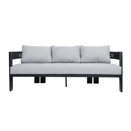 The Sorrelle 5 Seater Wicker Outdoor Sofa Set in Black features a modern three-seat design with a black metal frame, light-gray upholstered cushions, loose back pillows, and open-arm sides with woven detailing.