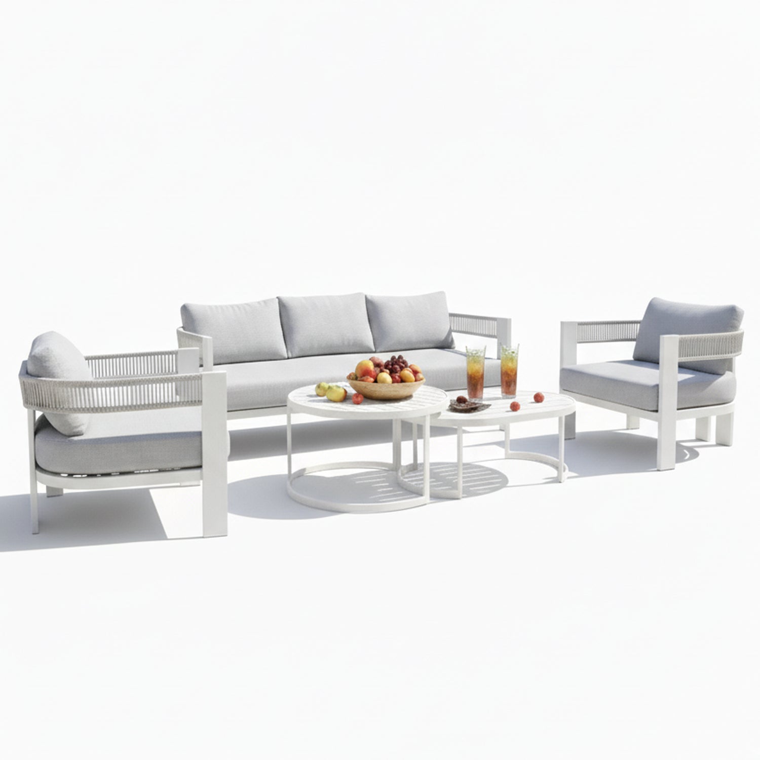 Sorrelle 5-Seater Curved Outdoor Sofa Set in Light Grey features a three-seat sofa, two armchairs, and nested coffee tables with fruit and drinks, creating a cozy outdoor setting.