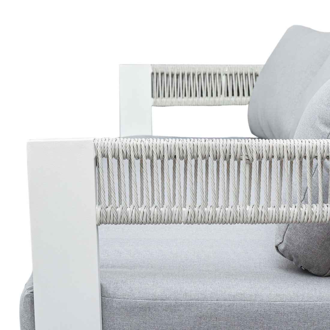 Close-up of Sorrelle 5 Seater Wicker Outdoor Sofa Set armrest, featuring a white metal frame with woven rope and light-gray fabric cushions, highlighting its modern design and outdoor durability.