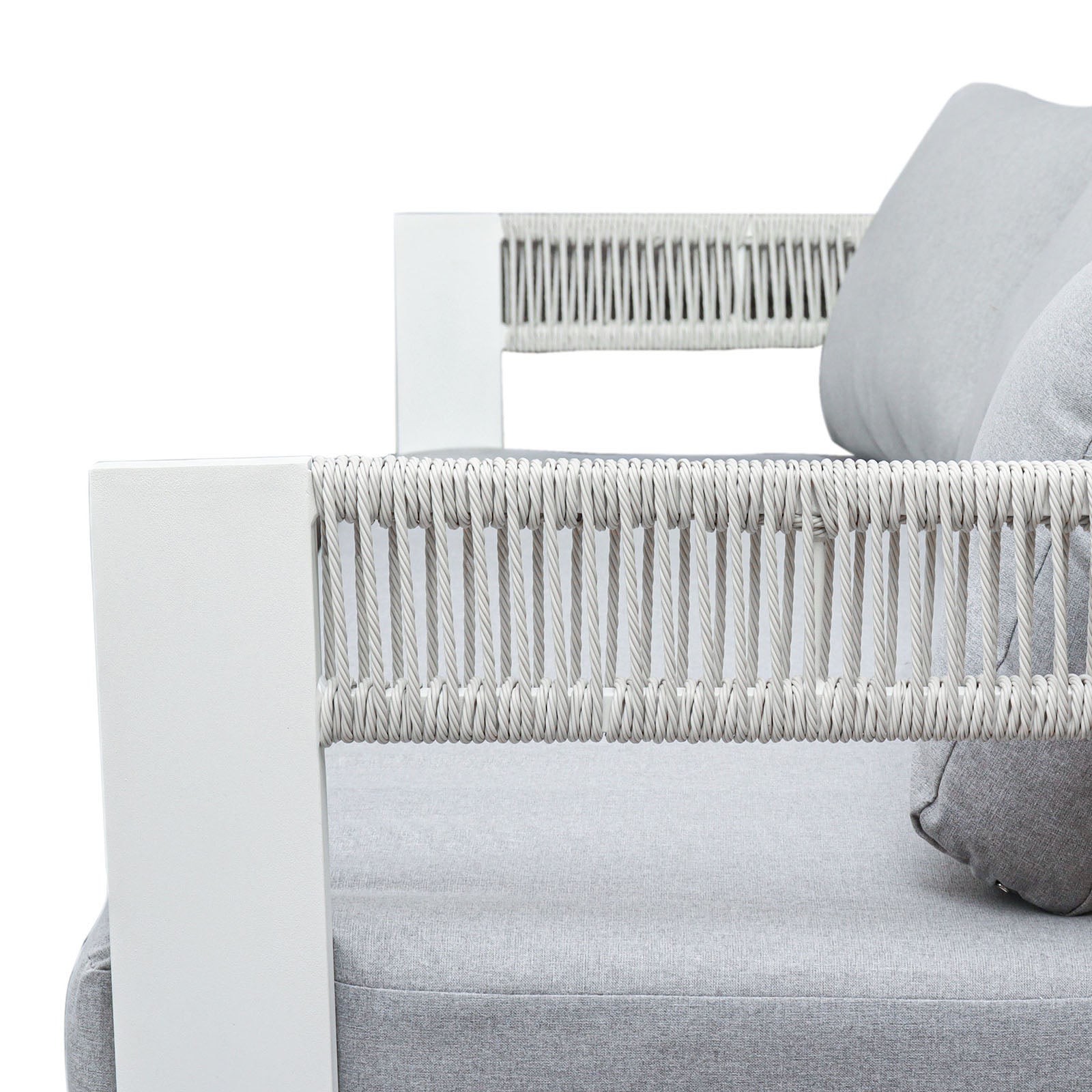 Close-up of Sorrelle 5 Seater Wicker Outdoor Sofa Set armrest, featuring a white metal frame with woven rope and light-gray fabric cushions, highlighting its modern design and outdoor durability.