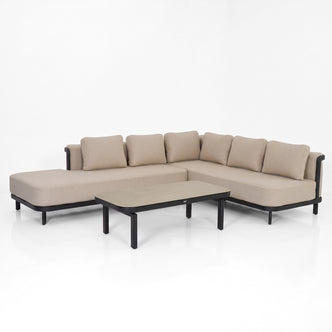 Modern beige sectional sofa with matching coffee table on white background.