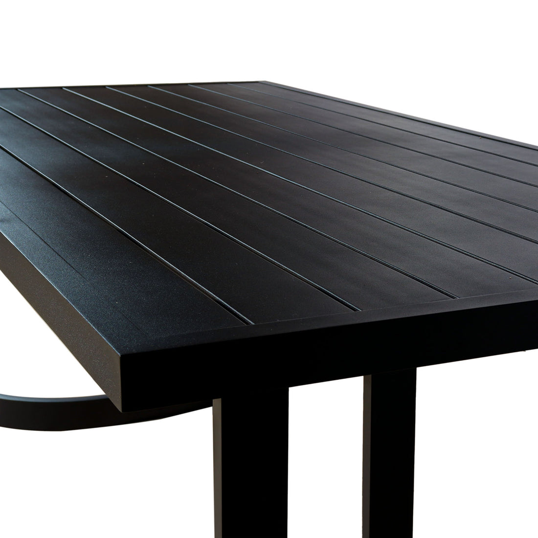 Tavari 6-Seater Aluminium Outdoor Dining Set in Black features a matte-black tabletop with narrow grooves, beveled edges, and sturdy legs, showcasing modern design ideal for outdoor settings.