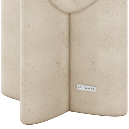 Valencia concrete side table, side view showcasing textured Antique White surface and sturdy base