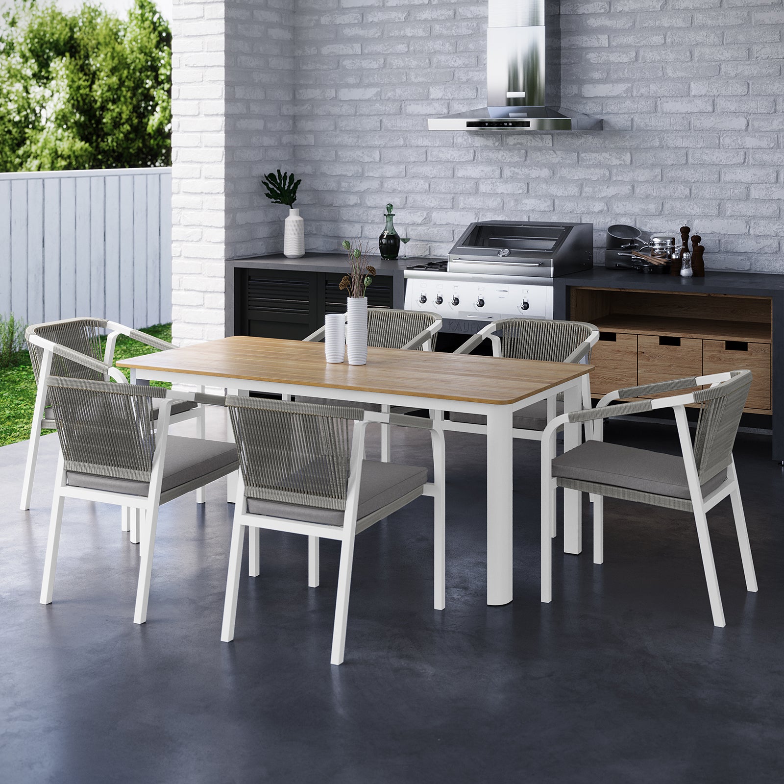 Vernon 6 Seater Aluminium Wicker Outdoor Dining Set features a sleek, spacious dining table with six wicker chairs, perfect for stylish outdoor gatherings, showcasing modern design and durable construction.
