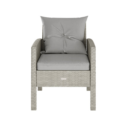 Vero 7 Seater Wicker Outdoor Sofa Dining Set featuring cushions and armrests, showcasing the sofa's wicker texture and futon pad, ideal for outdoor relaxation and dining.