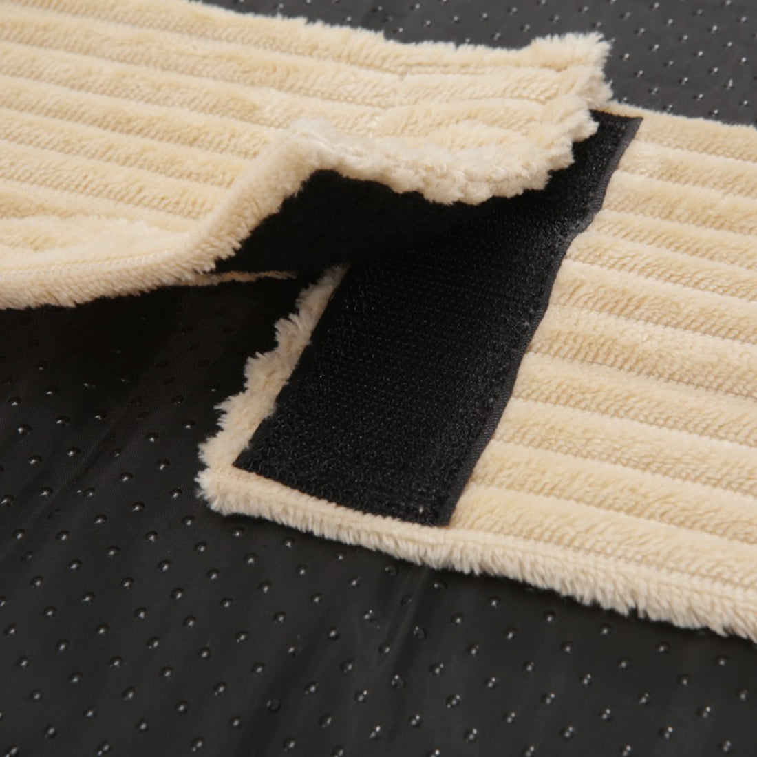 Dax Medium Corduroy Dog Bed – Soft & Stylish Beige with black velcro strap on plush, textured fabric, featuring bolstered sides for support and a sleek, modern design.