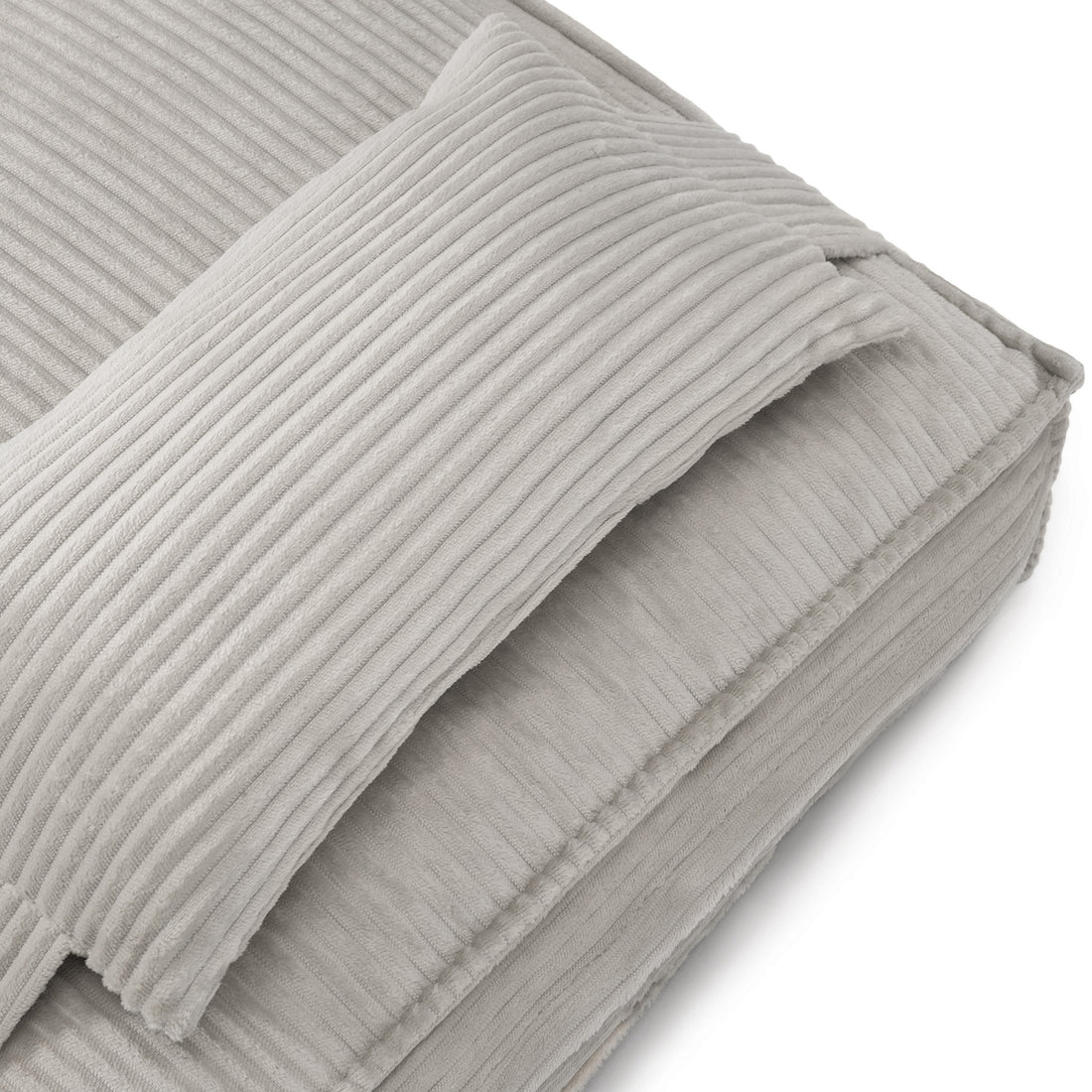 Dax Medium Corduroy Dog Bed – Grey Soft Support features textured corduroy fabric, plush filling, and bolstered edges, offering a cozy and stylish resting spot for pets.