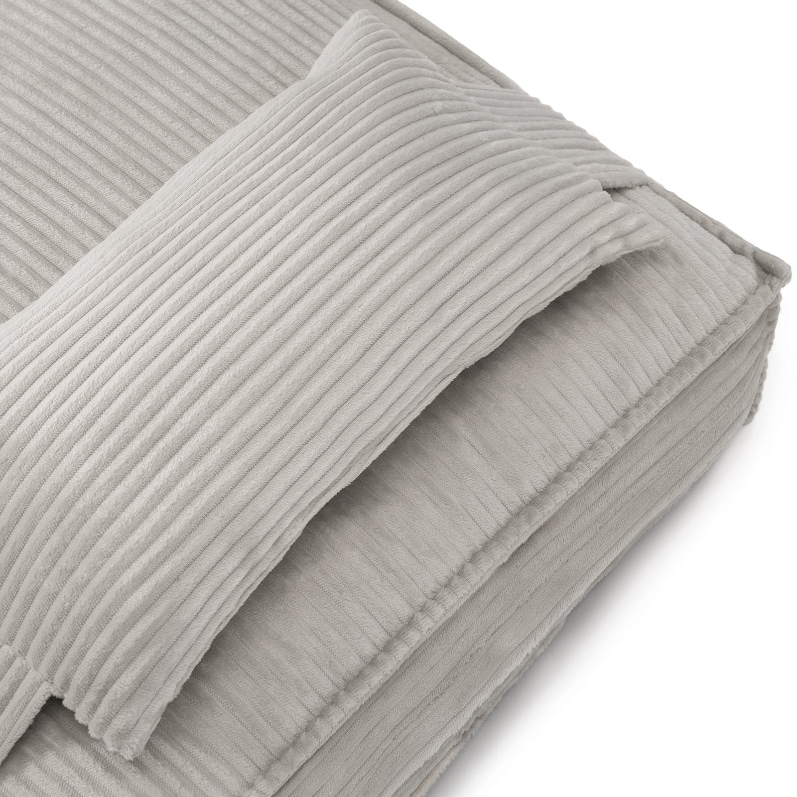 Dax Medium Corduroy Dog Bed – Grey Soft Support features textured corduroy fabric, plush filling, and bolstered edges, offering a cozy and stylish resting spot for pets.