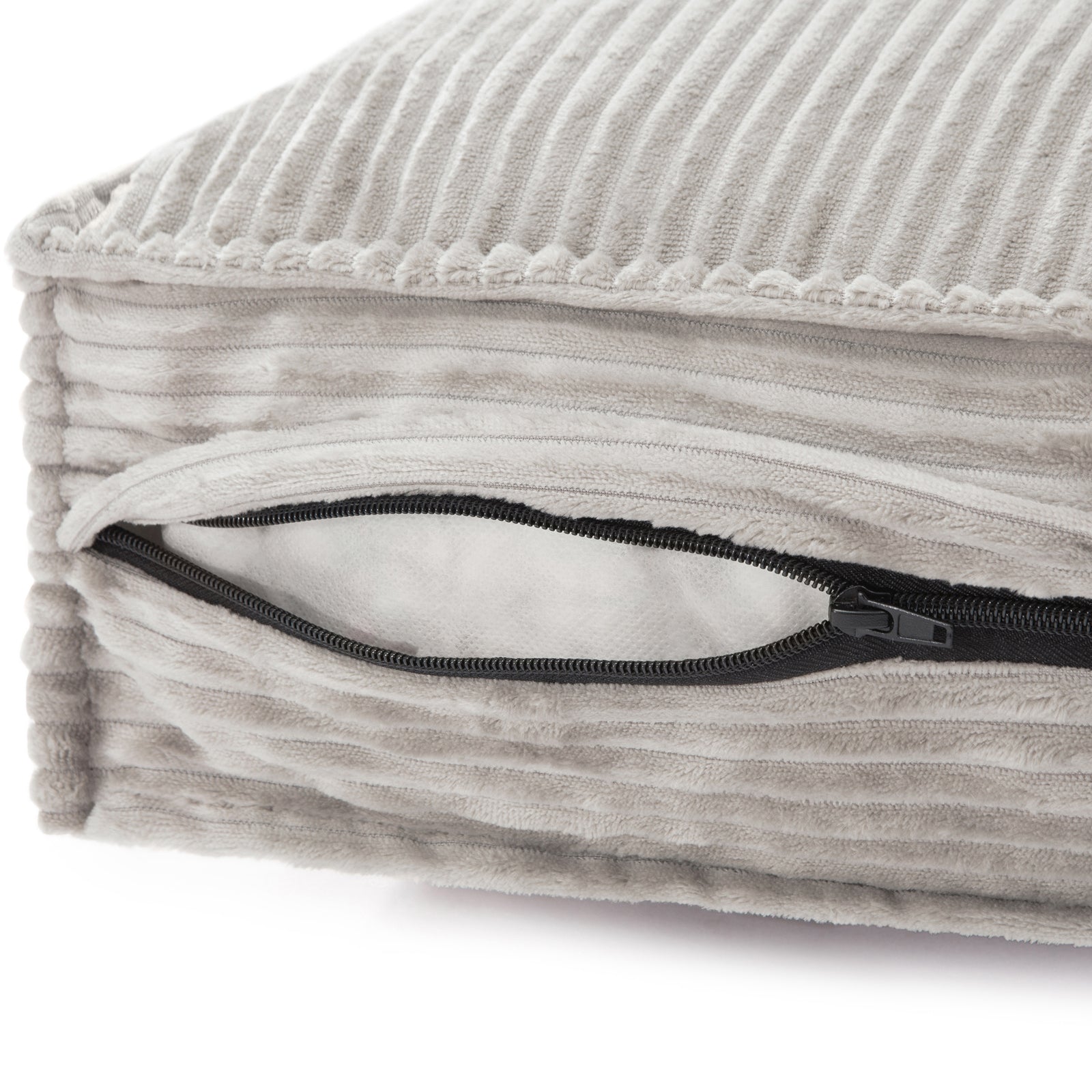 Dax Medium Corduroy Dog Bed – Grey Soft Support features a close-up of plush corduroy fabric, hidden zipper, and bolstered edges, showcasing durable stitching and fiber filling for enhanced pet comfort.